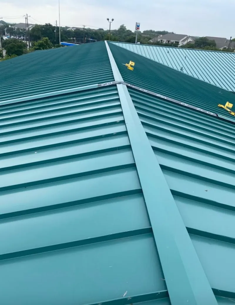 Green commercial metal roof ridge and valley for Metal Roof Repair in Marlene Village